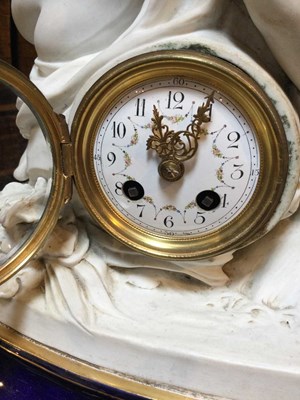 Lot 99 - A 19th century French bisque porcelain clock...