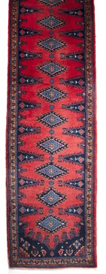 Lot 279 - A 20th century Middle Eastern red ground...