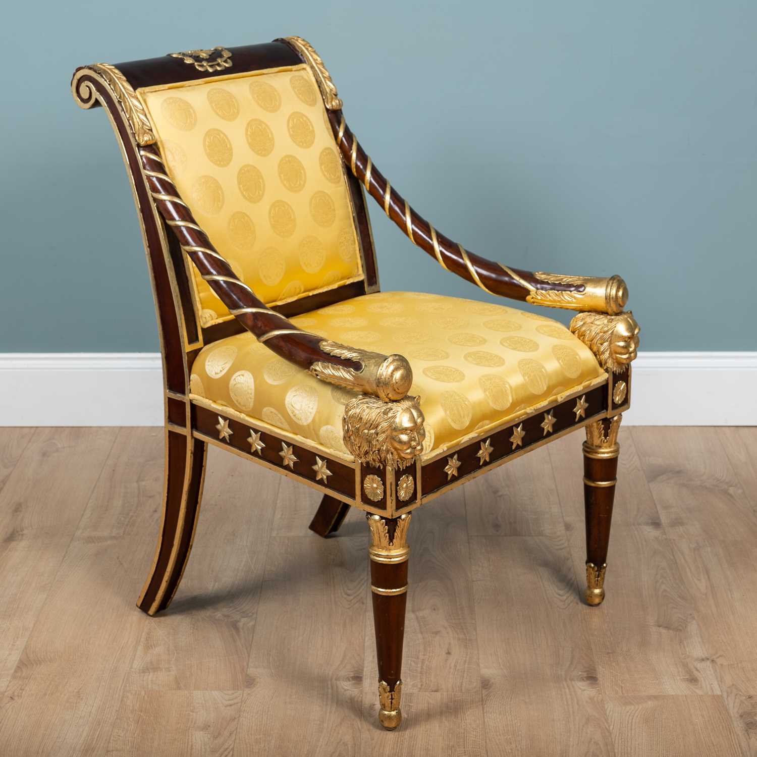 Lot 107 - A Versace Empire-style mahogany-framed library chair