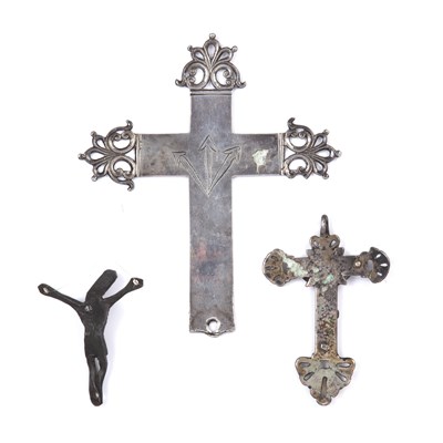 Lot 109 - A white metal crucifix 14cm wide 17cm high...