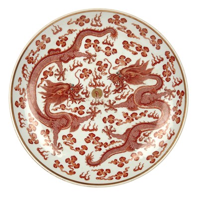 Lot 137 - Iron red dragon charger Chinese, late...