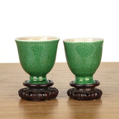 Lot 467 - Near pair of green crackle glazed cups Chinese,...