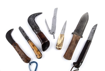 Lot 130 - A collection of seven knives to include four...