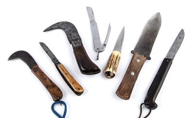 Lot 130 - A collection of seven knives to include four...