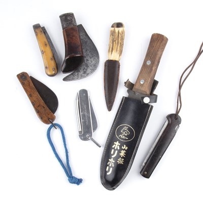 Lot 130 - A collection of seven knives to include four...