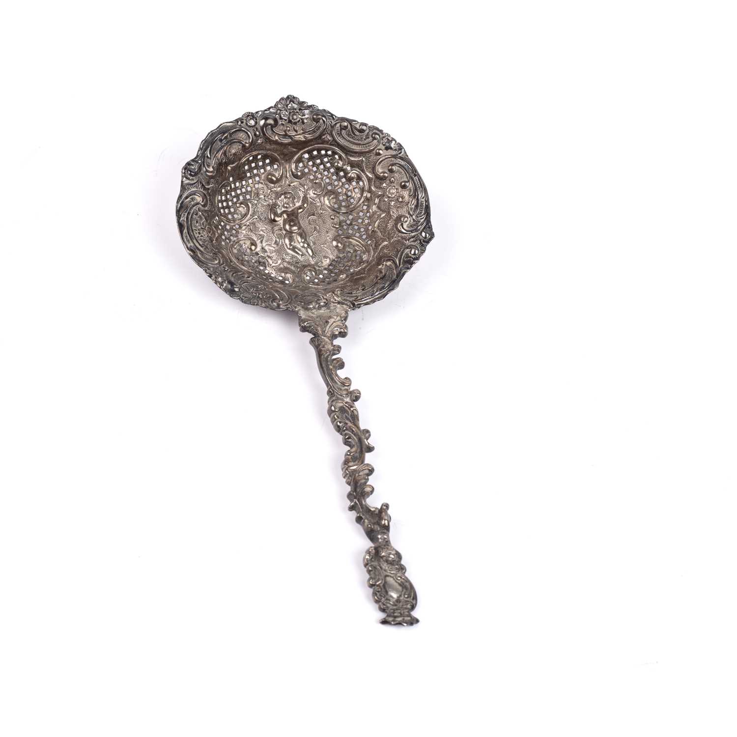 Lot 218 - Dutch import silver tea strainer Profusely...