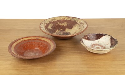 Lot 429 - Three glazed pottery bowls Middle Eastern the...