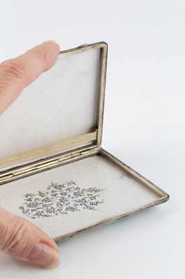 Lot 240 - A Persian enamel cigarette case, painted with...