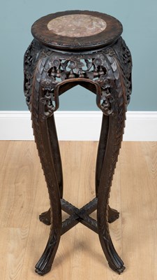 Lot 1171 - A 20th century Chinese hardwood jardinière stand