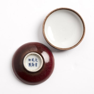 Lot 141 - Copper red glazed circular box and cover...