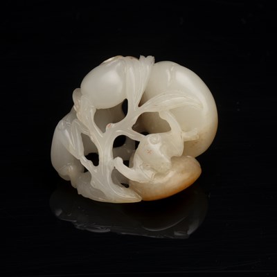 Lot 192 - White and russet jade ‘monkey and peach’ group...