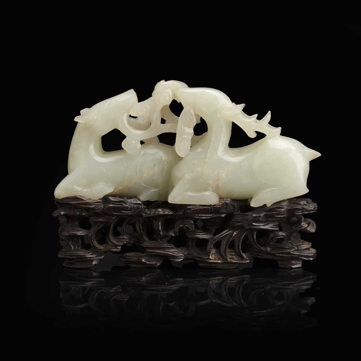 Lot 193 - Pale green ‘deer and lingzhi’ group...