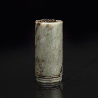 Lot 195 - Pale green and black jade cylindrical vase...