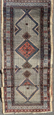 Lot 1285 - An early 20th century Heriz runner