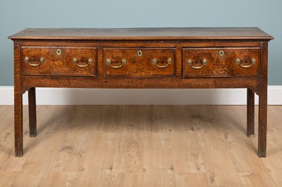 Lot 1056 - A George III oak dresser base