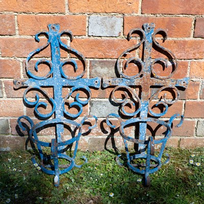 Lot 1391 - A pair of French wrought iron flowerpot brackets