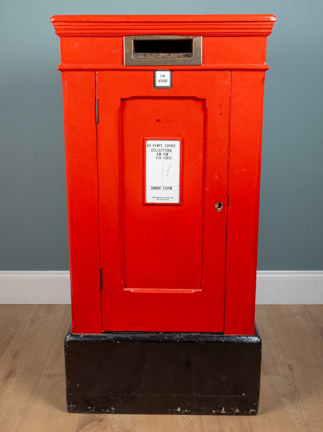 Lot 142 - A red-painted wooden postal box