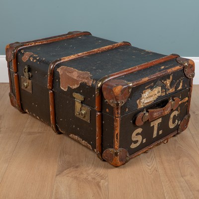 Lot 1020 - An old canvas wood-bound trunk