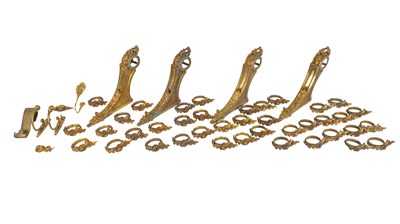 Lot 1522 - Two boxes of gilt metal curtain drapery hardware