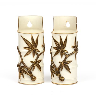 Lot 197 - A pair of Royal Worcester spill vases with...