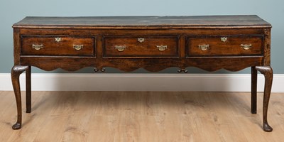 Lot 1032 - A Georgian oak dresser