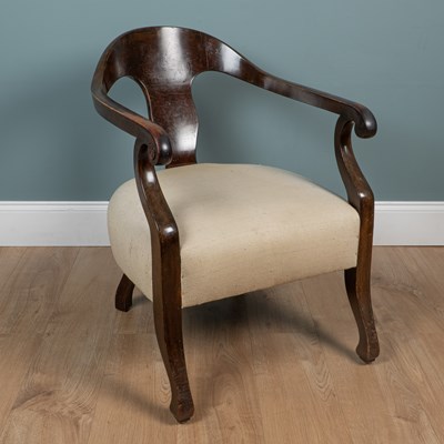 Lot 44 - A near pair of late 19th century mahogany-framed smoker's chairs