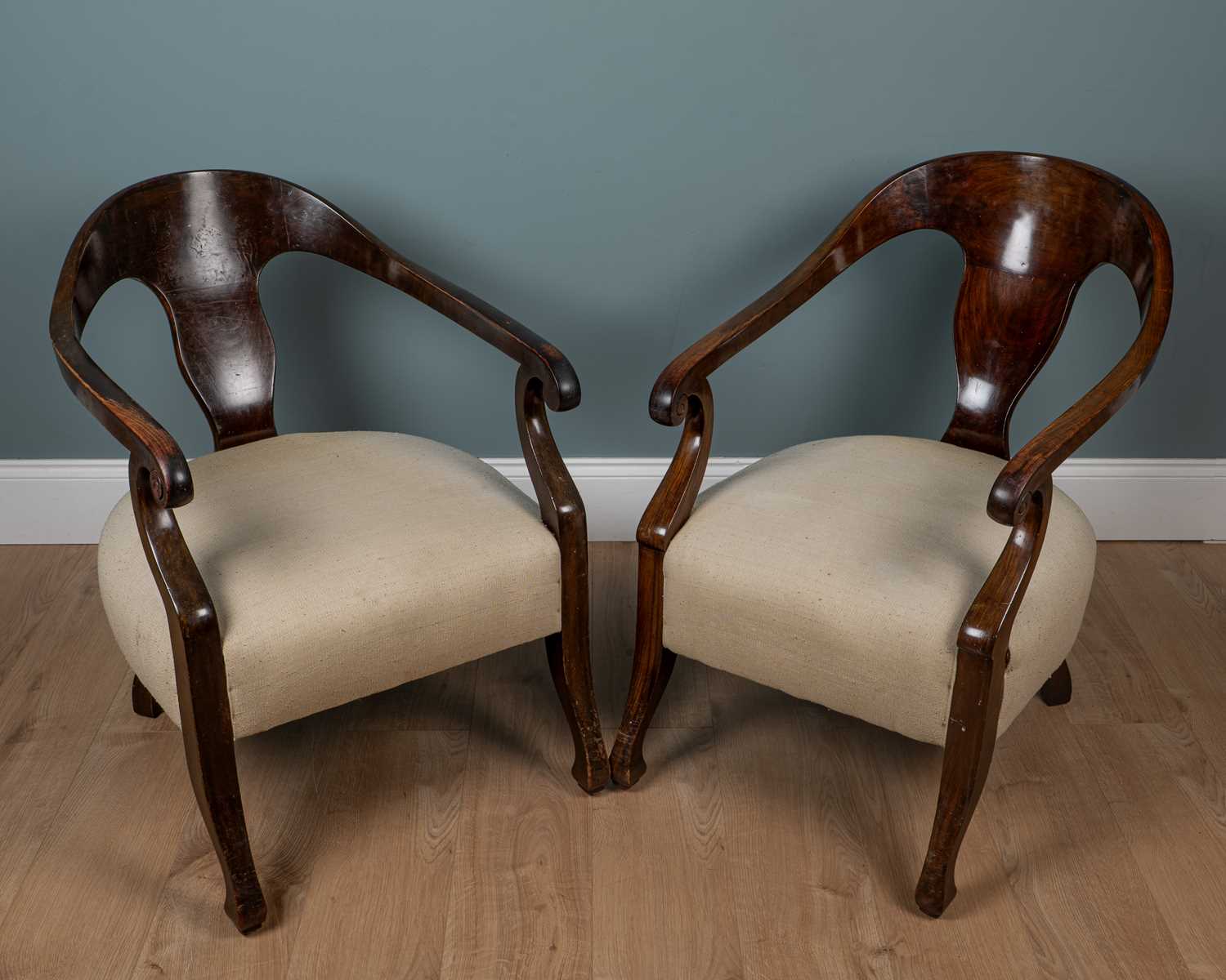 Lot 44 - A near pair of late 19th century mahogany-framed smoker's chairs