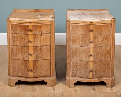 Lot 184 - A pair of limed oak bedside cabinets