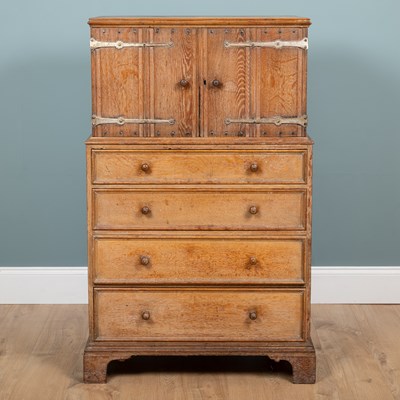 Lot 243 - A limed oak housekeeper's cupboard
