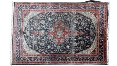 Lot 1275 - A 20th century hand woven Tabriz rug