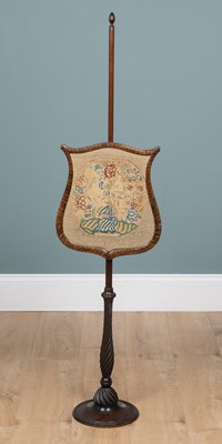 Lot 95 - A Regency mahogany polescreen