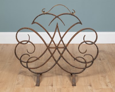 Lot 377 - A 20th century wrought iron fire guard from the V&A