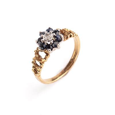Lot 205 - 18ct gold sapphire and diamond cluster ring...