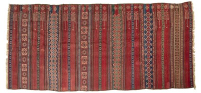 Lot 240 - A Tribal Baluch kilim with banded weft work...