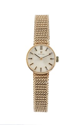 Lot 100 - A lady's 9ct gold bracelet watch by Omega, the...