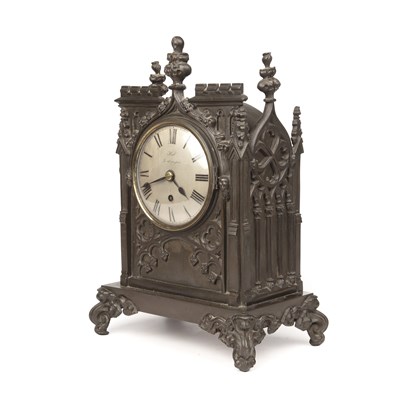 Lot 199 - A 19th century Gothic revival mantel clock by...