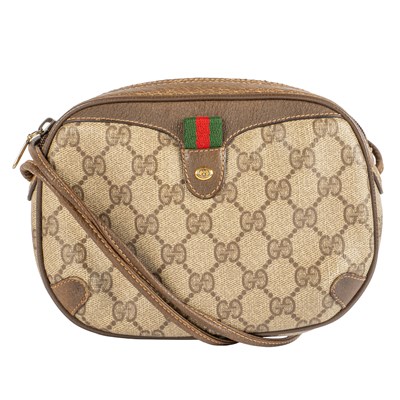 Lot 323 - A Gucci cross body bag in GG Monogram coated...