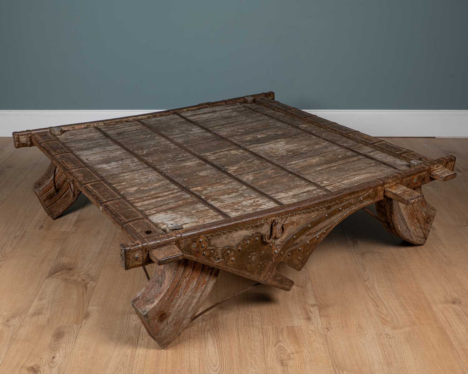 Lot 196 - An antique Indian ox cart top converted to a coffee table