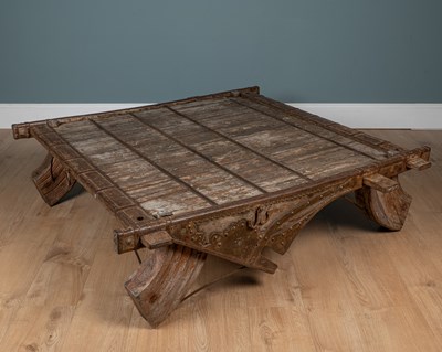 Lot 196 - An antique Indian ox cart top converted to a coffee table