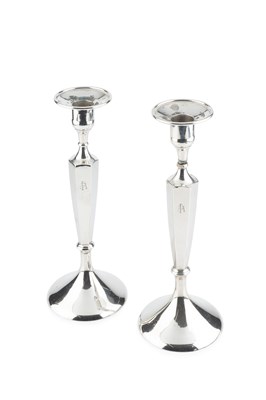 Lot 166 - A pair of American silver candlesticks, with...