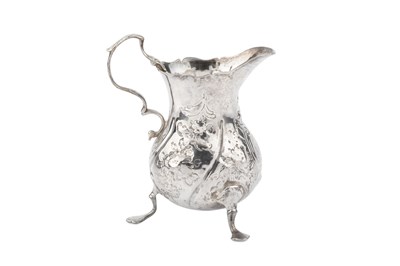 Lot 605 - An early George III silver cream jug, of...