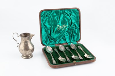 Lot 169 - An early George III silver baluster cream jug,...