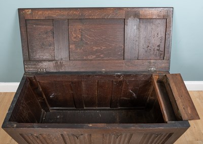 Lot 1103 - A 19th century oak six panel linen-fold coffer