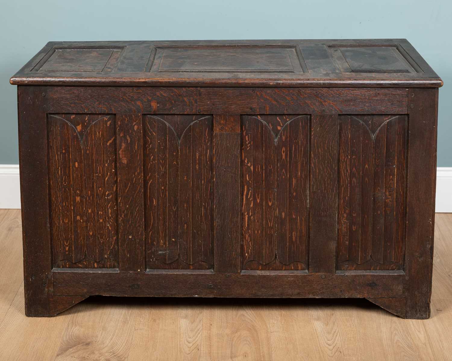 Lot 1103 - A 19th century oak six panel linen-fold coffer