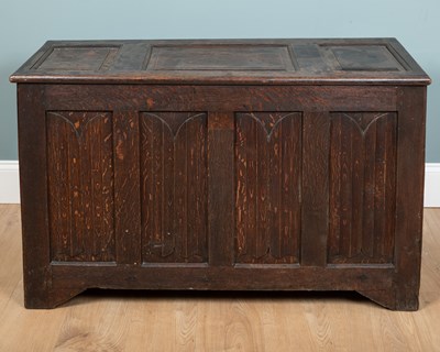 Lot 1103 - A 19th century oak six panel linen-fold coffer