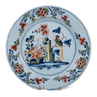Lot An 18th century English Delftware polychrome plate
