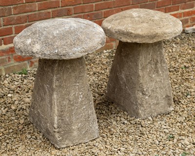 Lot 1488 - A pair of cast reconstituted stone staddle stones