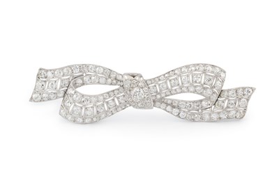 Lot A diamond bow brooch, designed as an...