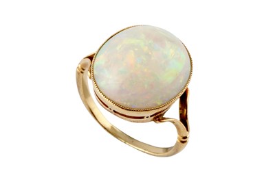 Lot 26 - An opal single stone ring, the oval cabochon...