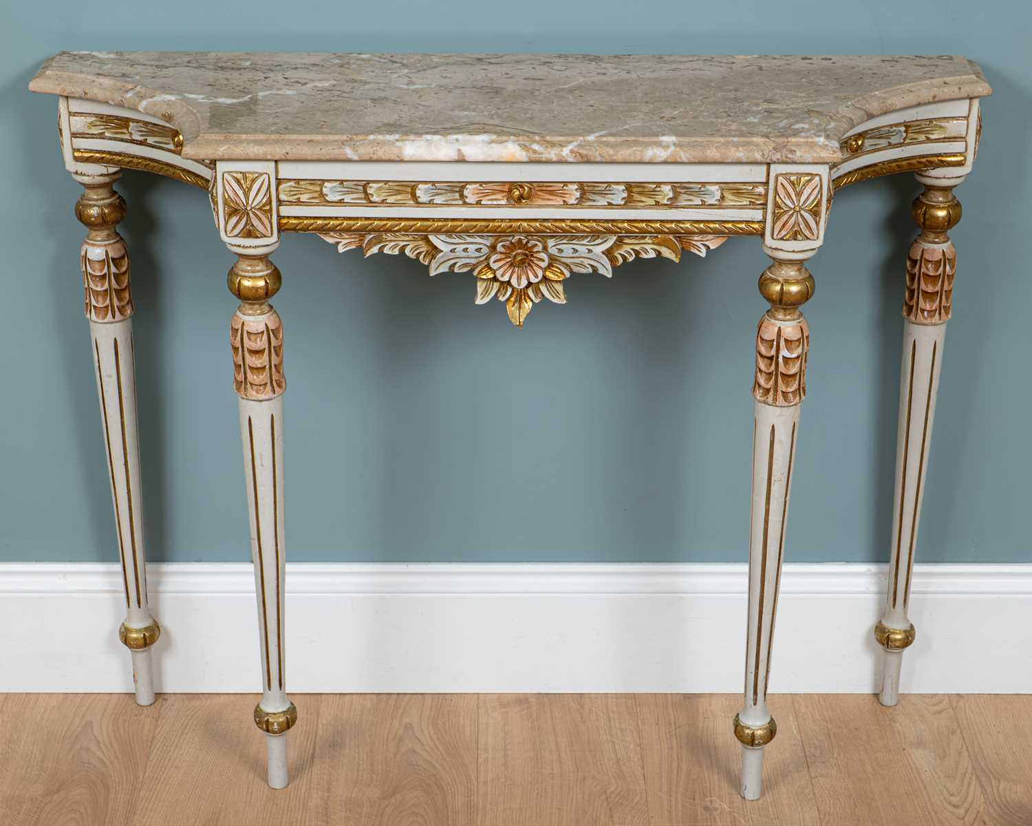 Lot 81 - Two Italian Hollywood Regency-style marble-topped tables